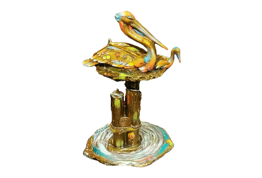 Signed, limited edition bronze pelican sculpture